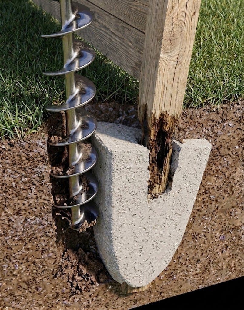An auger digging a compact hole beside a rotted wooden fence post and its existing concrete footing